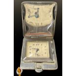 An Art Deco enamel flip top purse watch