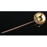 A 19th century yellow metal stick/scarf pin, the essex crystal cabochon head reverse painted with