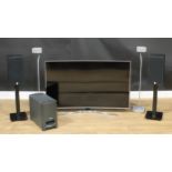 A Samsung UE55MU6670U TV; a Bose PS3-2-1 Powered Speaker System subwoofer; speakers; a pair of