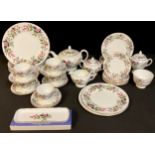 A Wedgwood Hathaway Rose pattern part dinner and tea service, comprising dinner plates, dessert