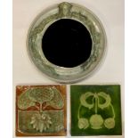 A Malahide Pottery Art Nouveau style circular mirror; two Art Nouveau tiles (3)