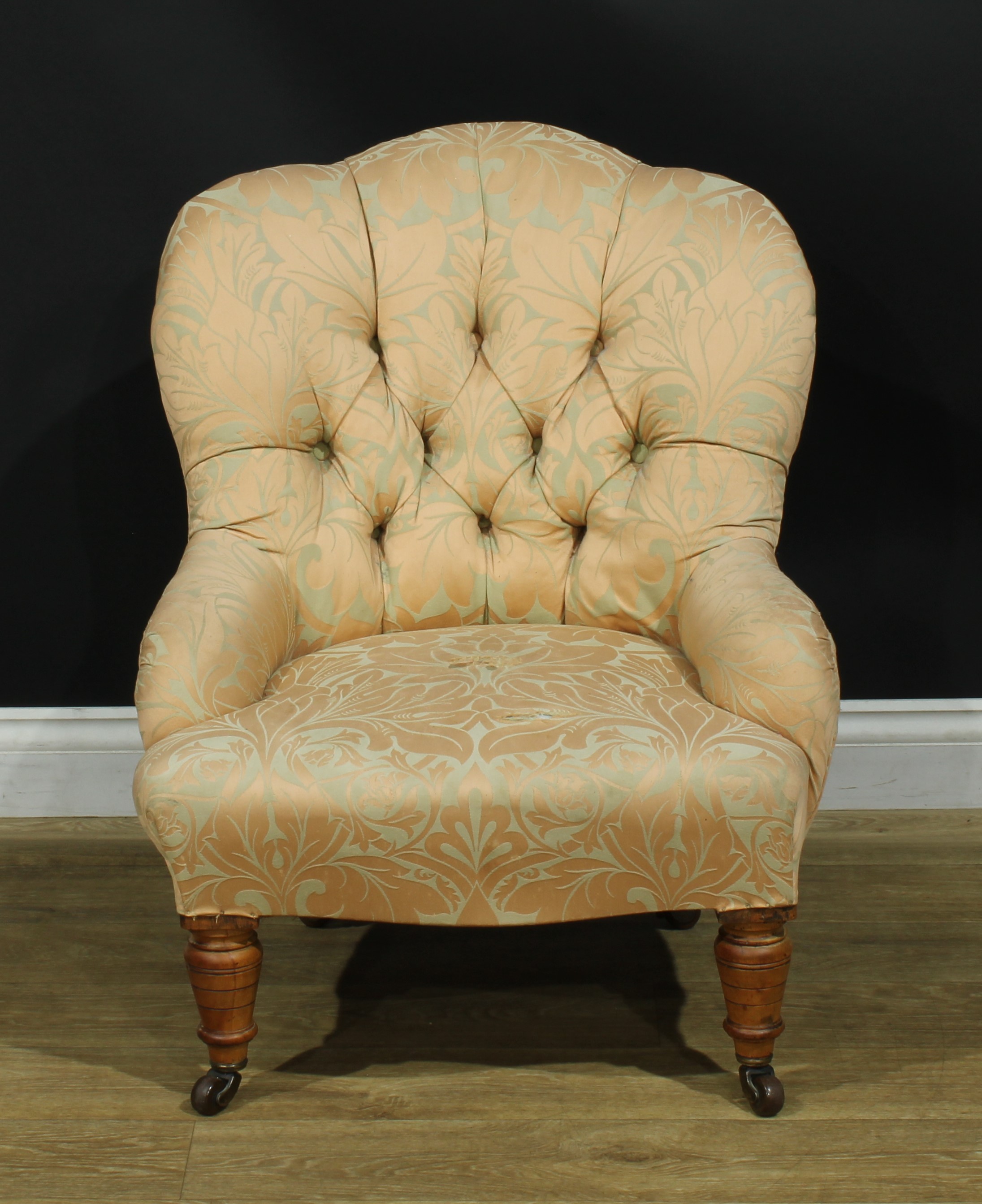 A Victorian drawing room easy chair, 78.5cm high, 63cm wide, the seat 38cm wide and 42cm deep