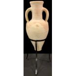 A stoneware two-handled amphora vase on stand, 77cm overall