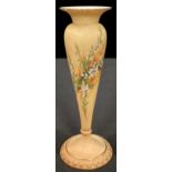 A Royal Worcester blush ivory pedestal vase, painted with heathers, picked out in gilt, shape number