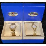 A pair of Tissot gold plated stainless steel watches, a lady's and a gentleman's, analogue quartz,