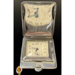 An Art Deco enamel flip-top purse watch
