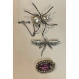 A silver and mother of pearl dragonfly brooch, marked 925; a silver spider brooch, unmarked; a pearl