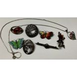 A sterling silver and enamel butterfly brooch, marked 925; another similar; a sterling silver and