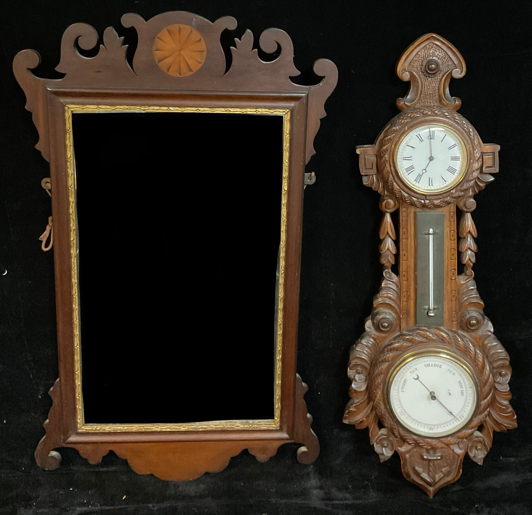 An Edwardian wall hanging combination aneroid barometer, thermometer and timepiece, of maritime