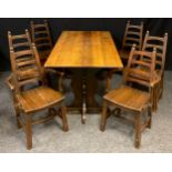 A mid 20th century oak dining room suite, comprising oak trestle table 76cm tall x 144cm x 76cm;
