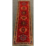 A North-West Persian Heriz Runner carpet, 285cm x 90cm.