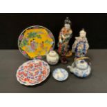 A large Japanese figure, maiden standing, 37cm high, another smaller 30cm high; teapot; plates etc