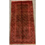 A North-East Persian Hatchli rug, 175cm x 90cm.