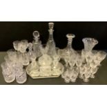 A matched suite of lead crystal drinking glasses, Webb Corbett, Royal Doulton etc inc decanters,