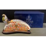 A Royal Crown Derby paperweight, The 250 collection Golden Pheasant, signature edition, gold