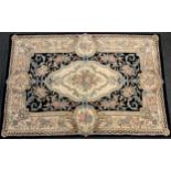 A pure wool Chinese 'Savonnerie' rug / carpet, made for G. H. Frith of Bodelwyddan, UK, in black,