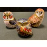 A Royal Crown Derby paperweight Tawny Owl; others Short Eared Owl; Little Owl, all gold stoppers (3)