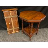 An Edwardian mahogany octagonal occasional table, turned legs, galleried under tier, 69cm high, 60cm