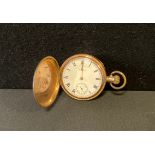 A Waltham Traveller gold plated full hunter pocket watch, 4.8cm diameter