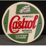 A painted cast iron advertising plaque, Castrol Motor Oil, Isle of Man T.T Races, 24cm diameter