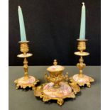 A Louis XV style gilt metal and enamel desk set, inkwell and pair of candlesticks each decorate with