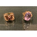 A 9ct gold garnet cluster ring, size N another oval pale pinky purple amethyst, 9ct gold shank, size
