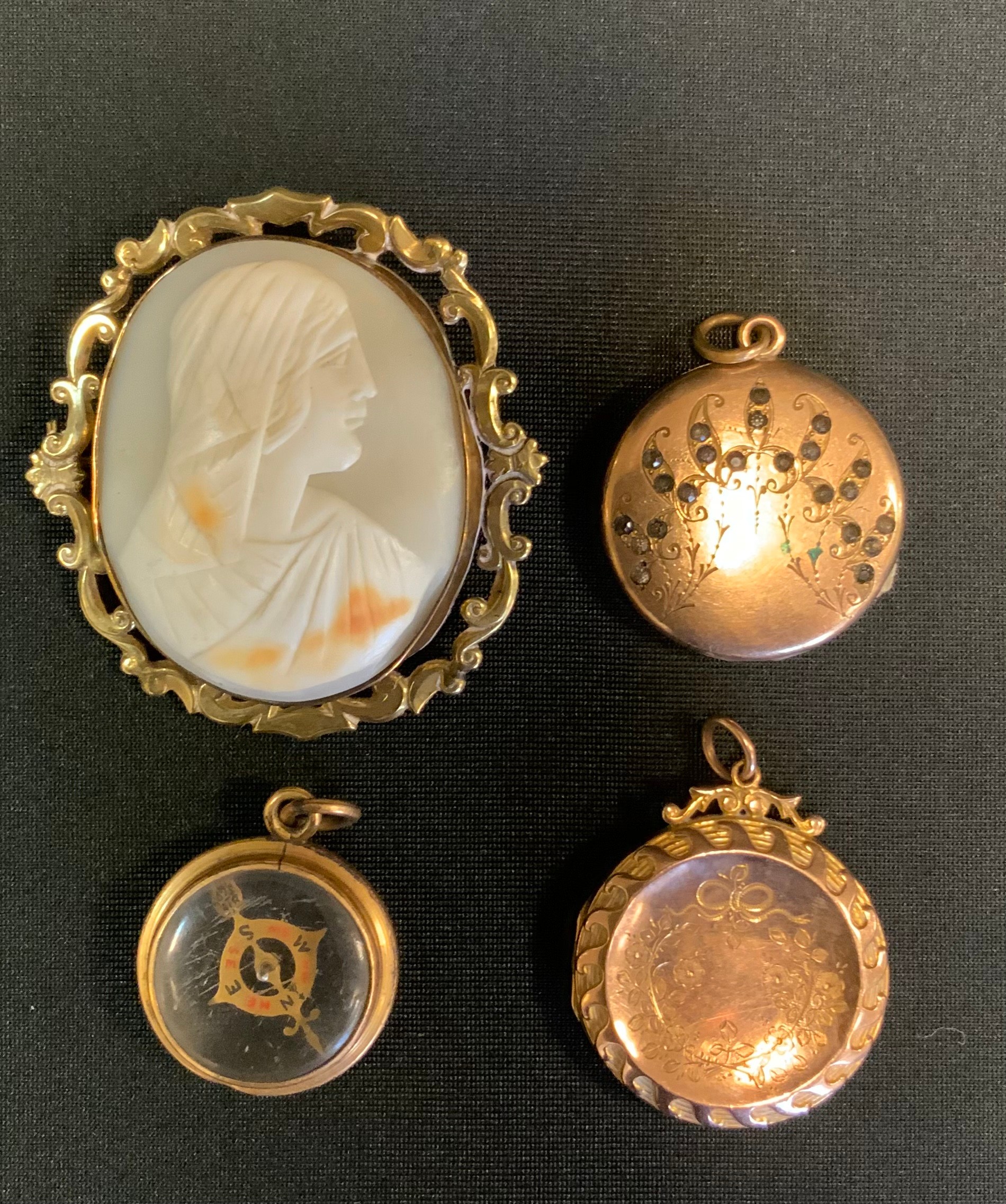 A Victorian cameo brooch, Madonna, gilt metal mount, 5.5cm x 50cm; rolled gold locket; another;