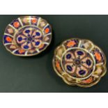 A Royal Crown Derby Imari 1128 pattern shaped circular dish; another, both 17.5cm diameter, both