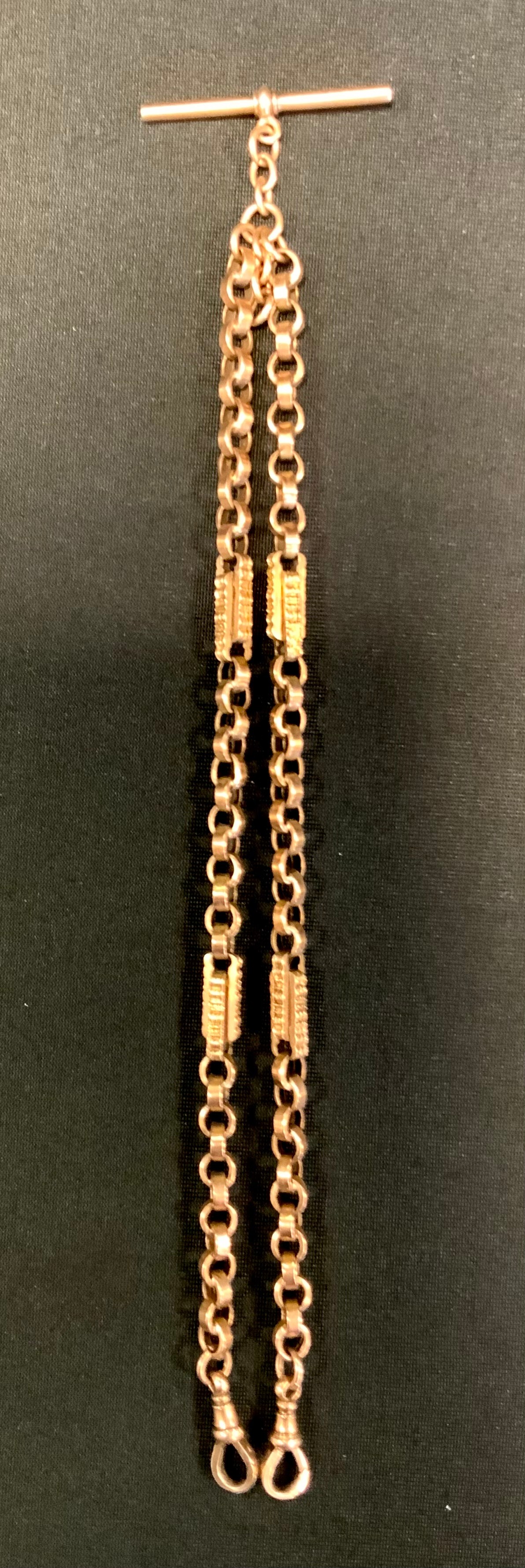 A fancy link gold coloured metal double Albert chain, T bar terminal, 38cm long, stamped 9ct, 17.1g