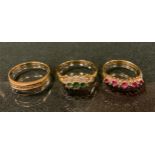 Rings - a diamond ring, channel set with nine round cut diamonds, 9ct gold shank, size N; others