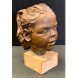D Barrett (20th Century), a bronze coloured resin portrait bust, Childs head, signed verso, wooden