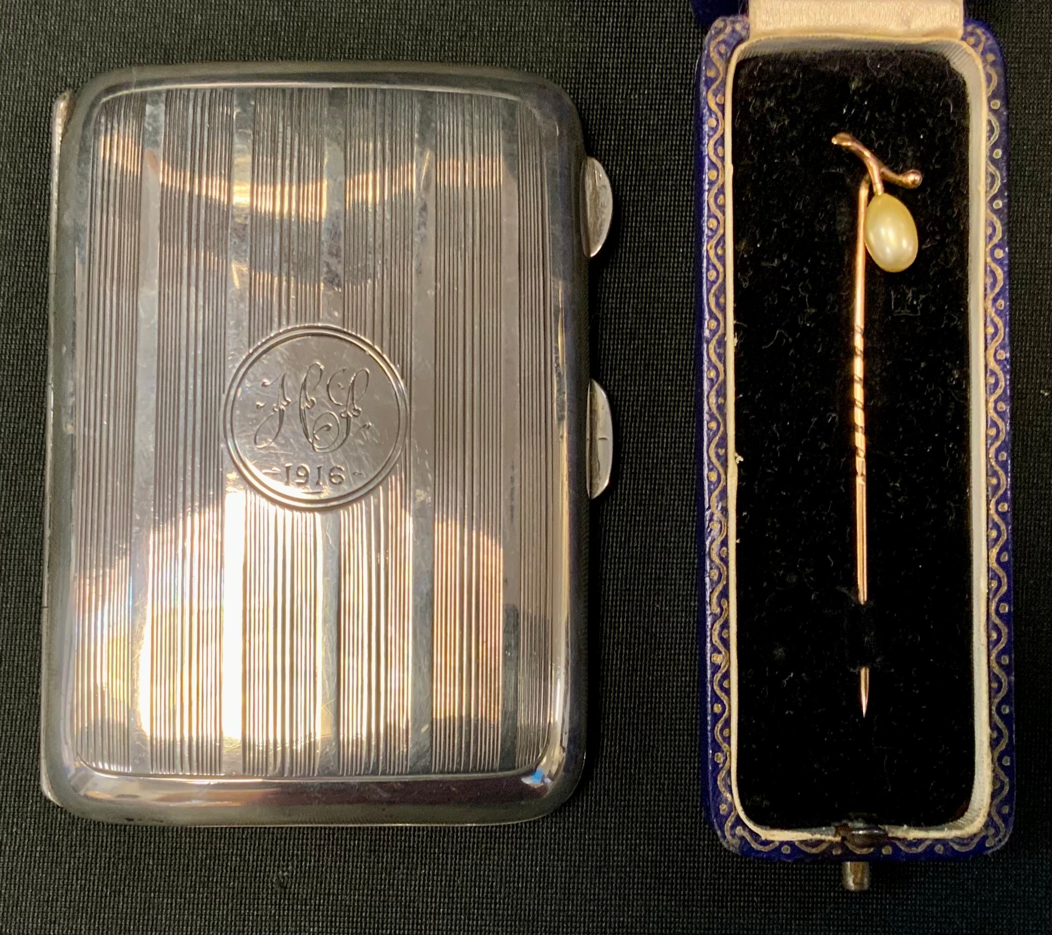Jewellery & Silver; a 9ct gold oval pearl set tie pin, stamped 9ct, 1g gross, cased; a silver