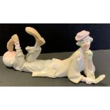 A Lladro figure, Clown, designed by Salvador Furio in 1970, the figure lying on his front with