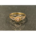 A diamond solitaire ring, round brilliant cut diamond approx 0.05ct, 14ct gold shank, stamped 585,