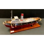 A Static model of a World War II period Justy Tug Boat, on stand, 52cm long