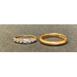 A 22ct gold wedding band, size K, 3.9g; a diamond seven stone engagement ring, indistinctly marked