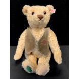 A Steiff Sherwood Bear, Blond, with growler, 32cm tall, limited edition number 211 of 1500, hand