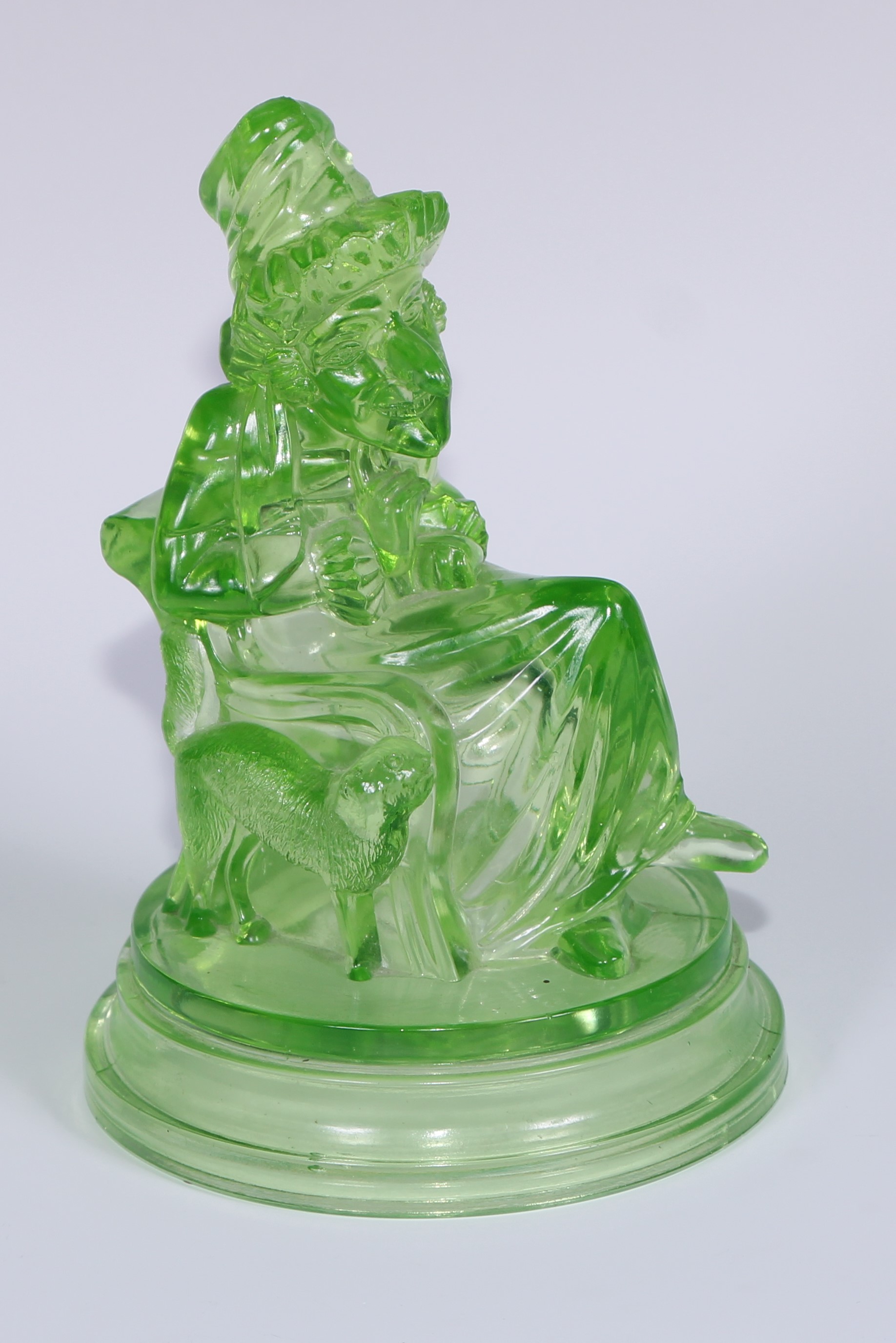 A pair of John Derbyshire press moulded uranium glass models, of Mr Punch and Judy, circular - Image 2 of 11