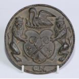 Heraldry - a 19th century bronze armorial boss, cast in relief with a coat of arms comprising