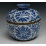 A Chinese bowl and cover, painted in tones of underglaze blue with flowers, scrolling leaves and