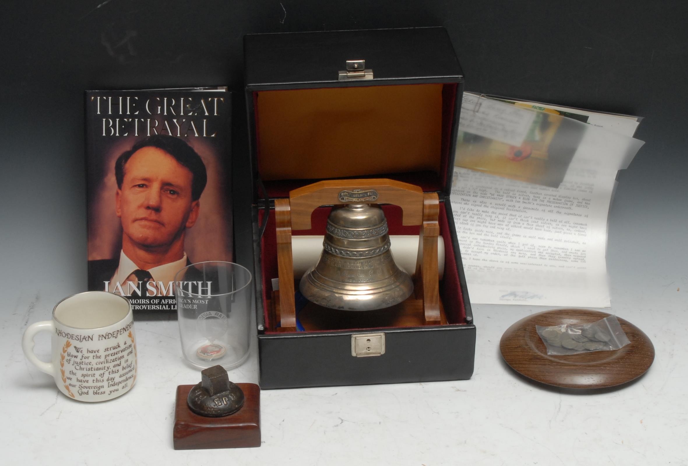 African History - Rhodesia [Zimbabwe] - a silver model of the Independence Bell, 19cm wide, c.1975