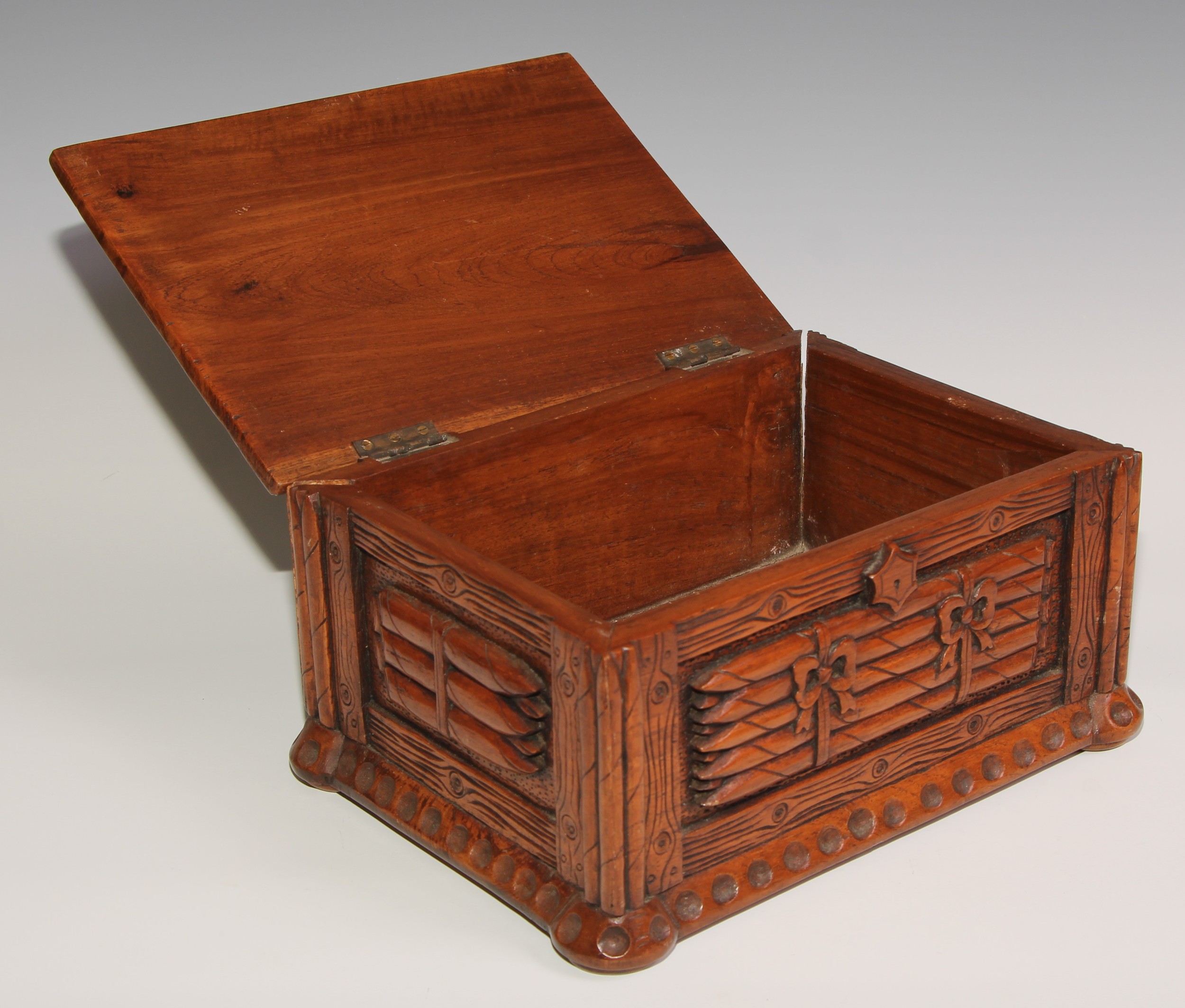 An unusual hardwood rectangular cigar box, carved and surmounted with bundles of cigars, 30cm - Image 3 of 5