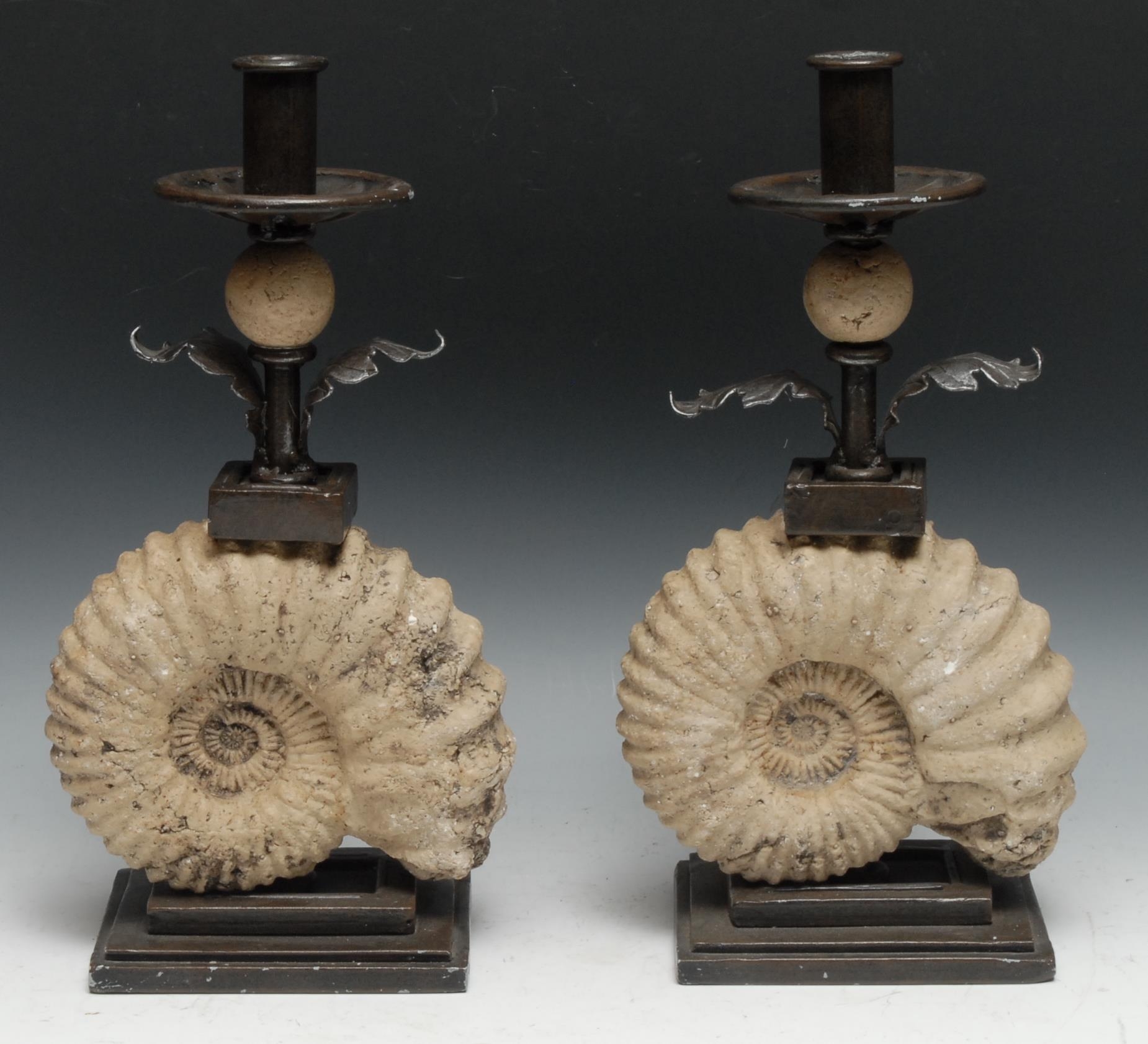 Interior Decoration - a pair of unusual wrought steel and faux-palaeontological candlesticks, each
