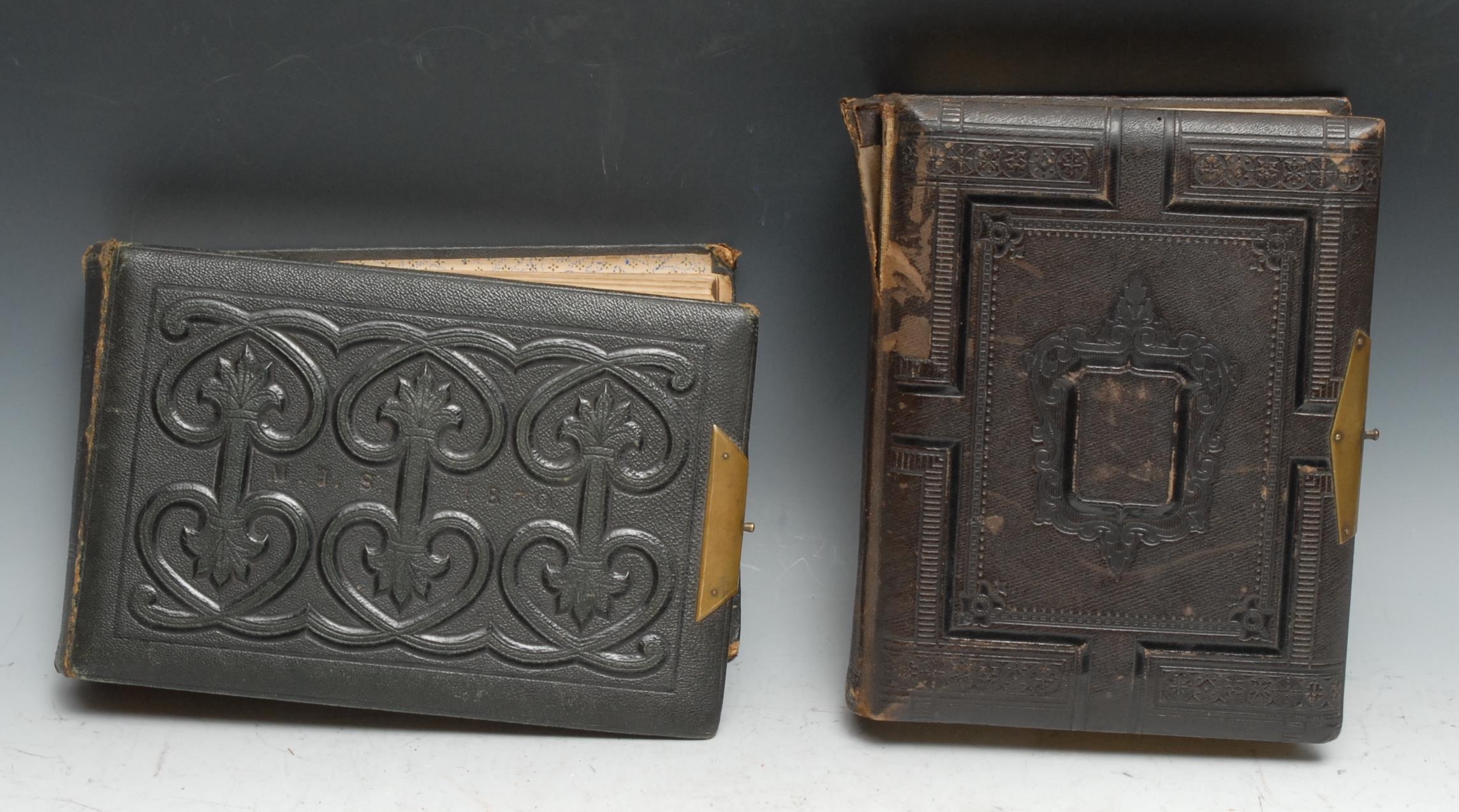 Photography - a 19th century tooled leather carte de visite album, containing various single and