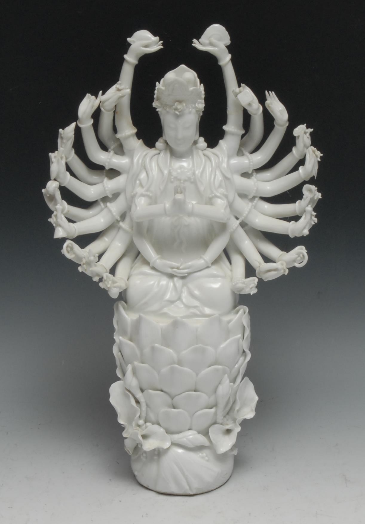 A Chinese Buddhist blanc de chine figure, of Avalokiteshvara, 33.5cm high