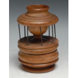 Treen - a 19th century boxwood cotton reel stand, surmounted by a wool holder, compartment to
