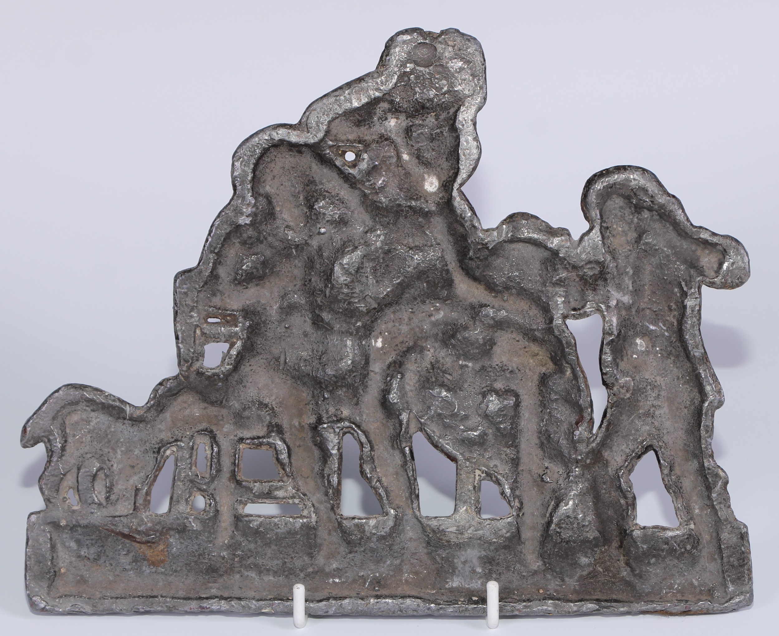 A 19th century lead plaque, cast with a genre scene, 21cm wide - Image 2 of 2