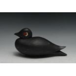 A painted softwood decoy duck, 24cm long