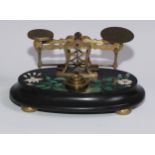 A set of Derbyshire Ashford marble letter scales, inlaid in malachite and specimen stones with