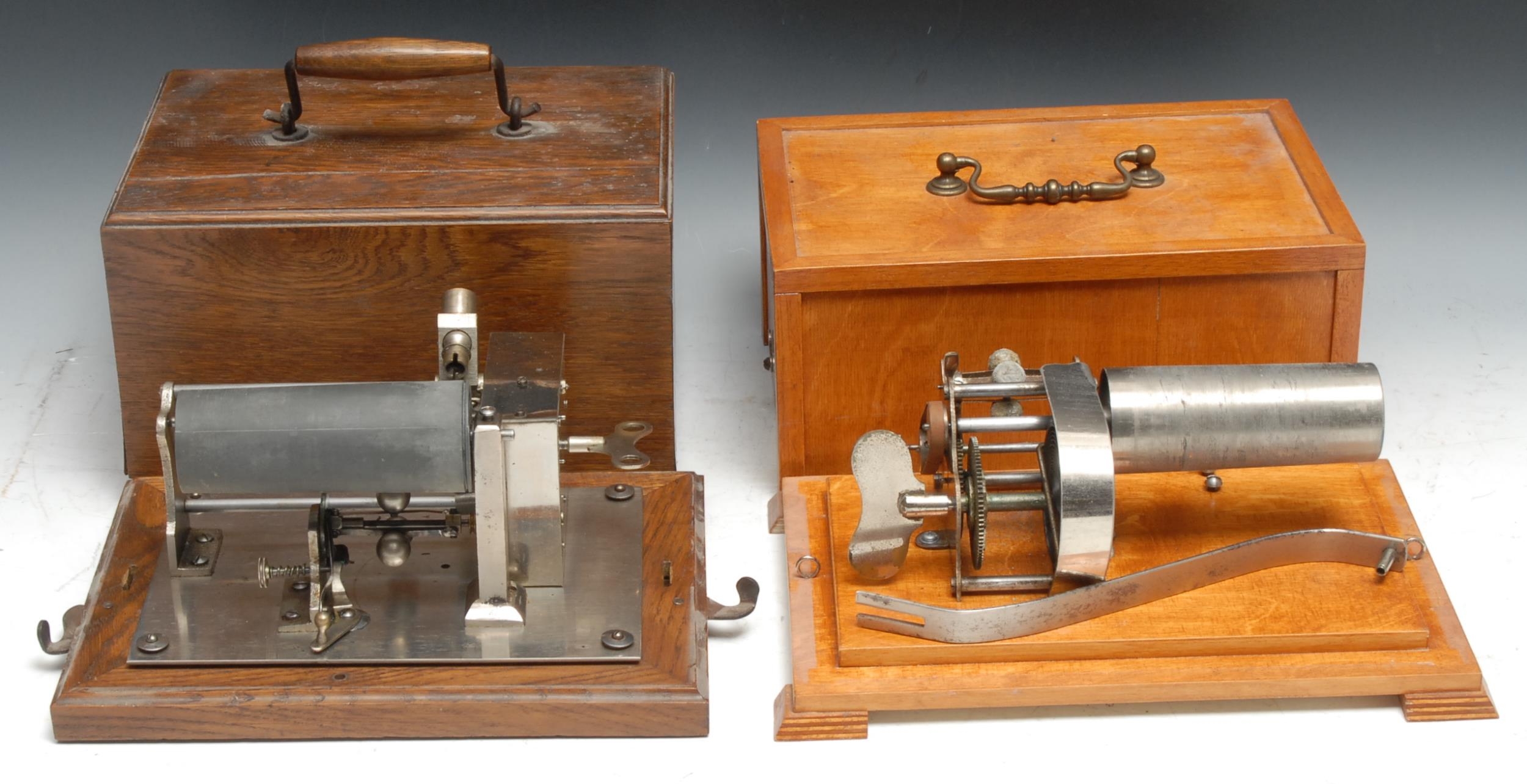 An early 20th century cylinder phonograph, later case; another (2)